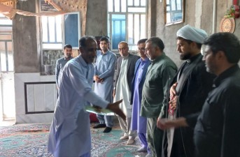 تجدید میثاق مسئولان خاش با آرمان‌های شهدا در دیدار با خانواده شهید «ایمان شهنوازی»